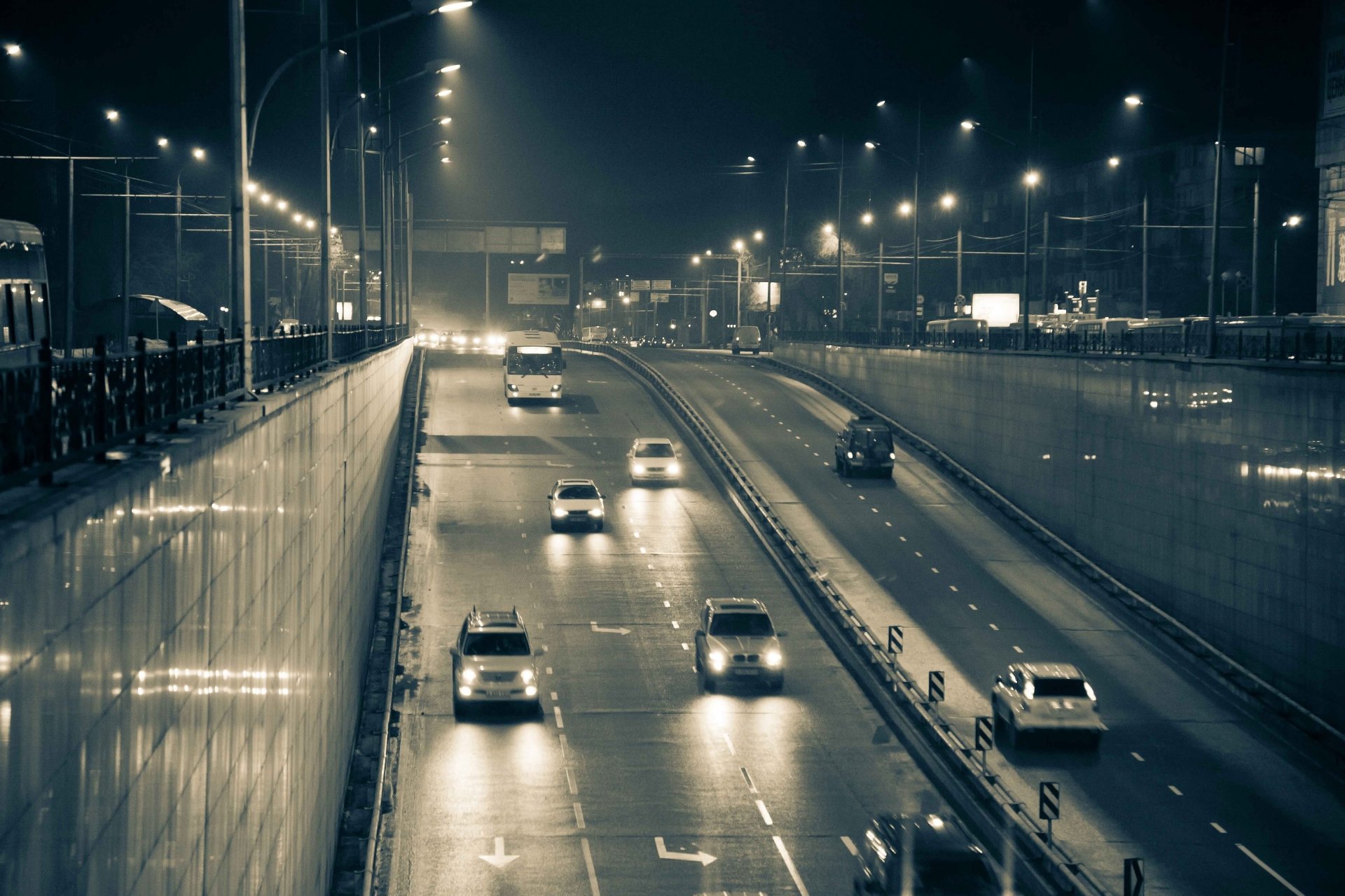 city night entrance to tonel cars lights headlight