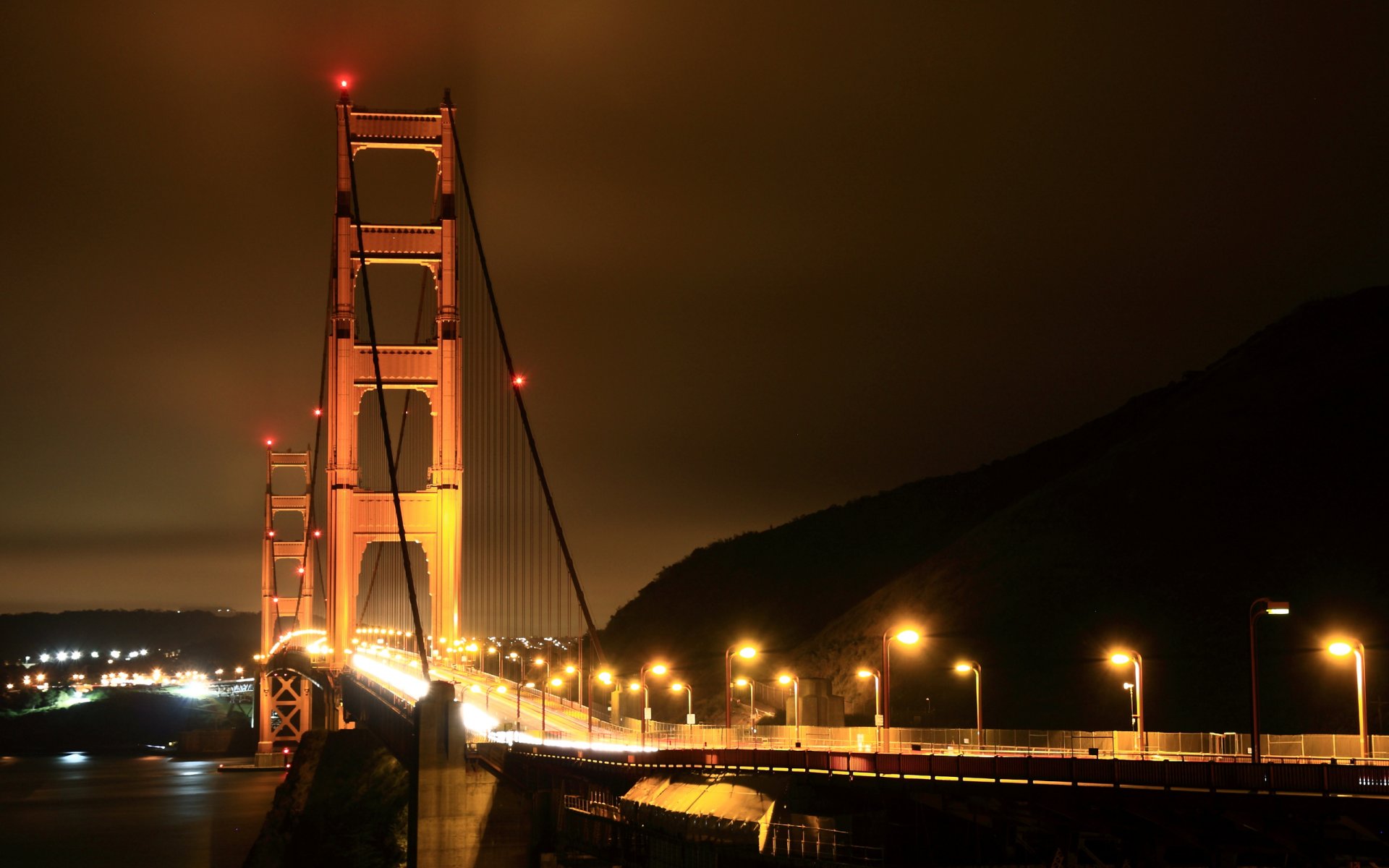 città america stati uniti stati ponti notte strada strade oceano mare acqua luce luci case