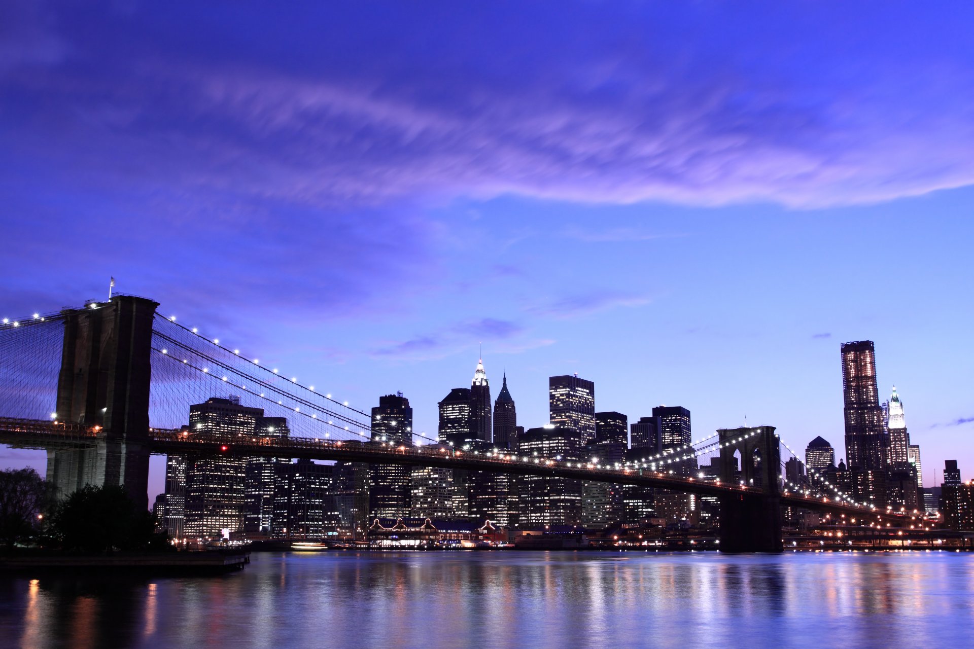 new york city brooklyn bridge evening lights sky cloud