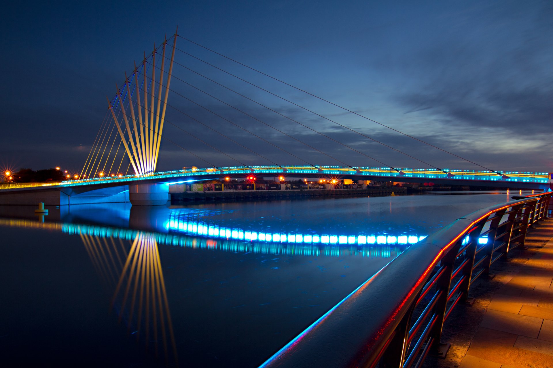 town night bridge lights rails close up embankment