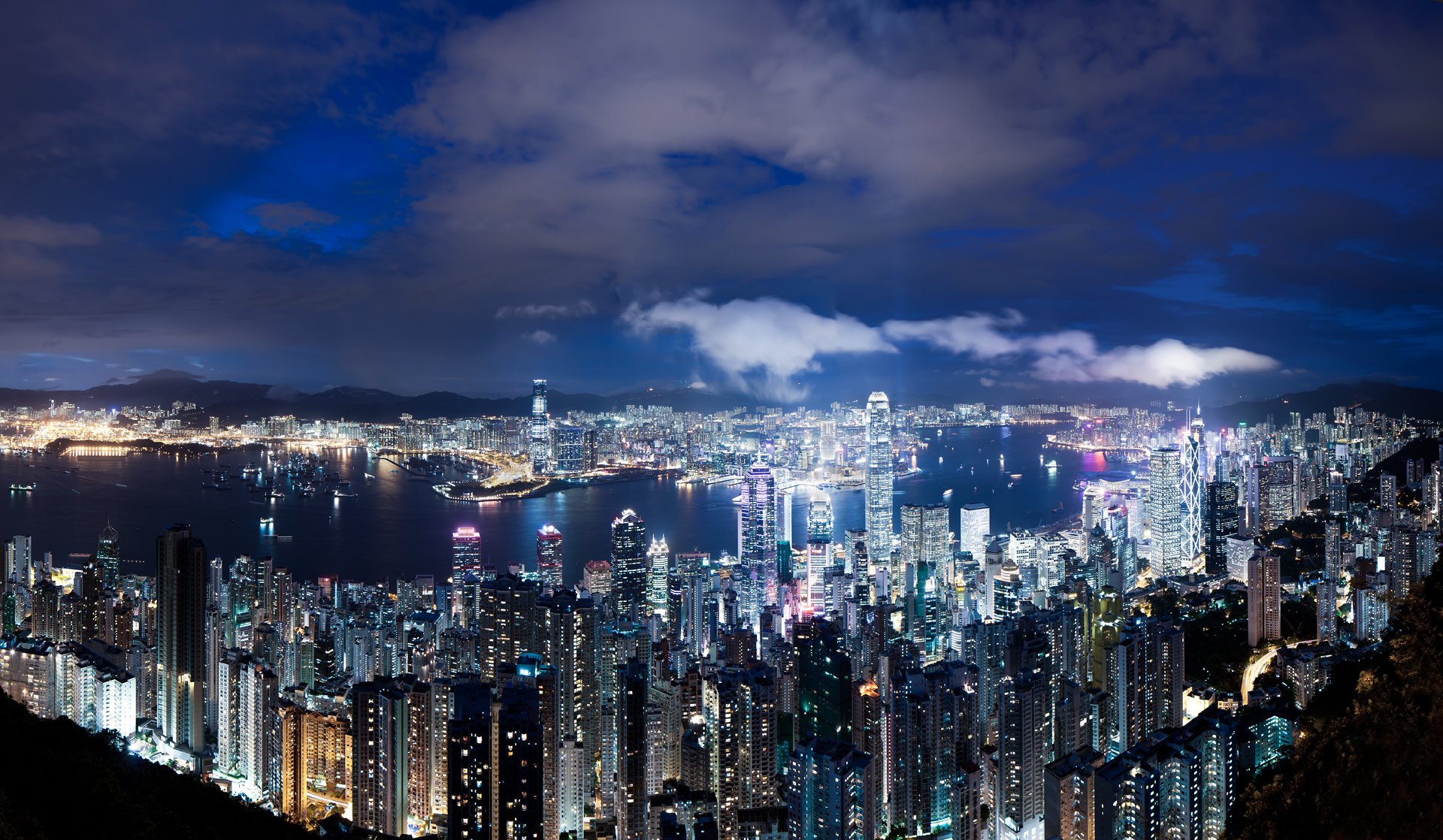 hong kong china night metropolis skyscraper lights light blue sky clouds panorama views height