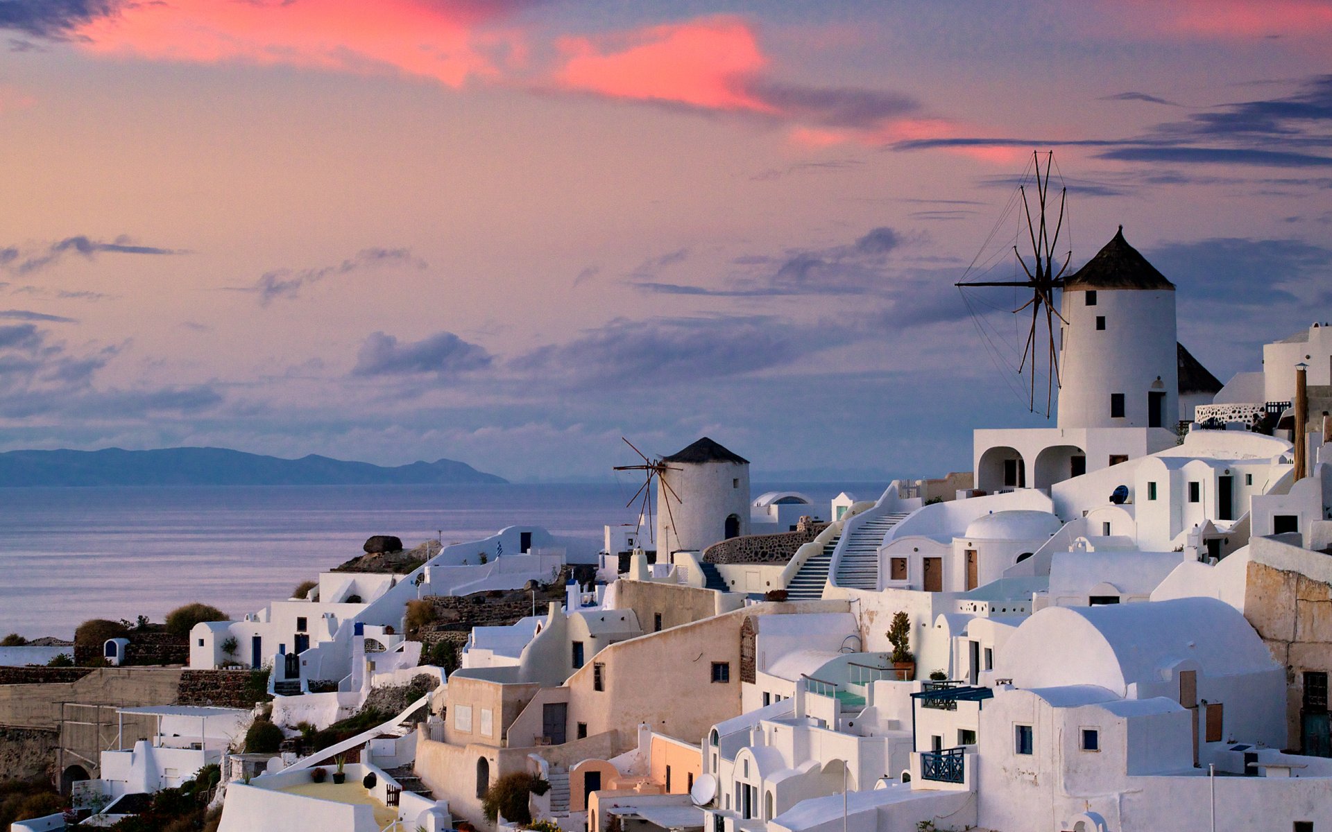 oia griechenland stadt häuser sonnenuntergang ozean wasser himmel wolken 2560x1600