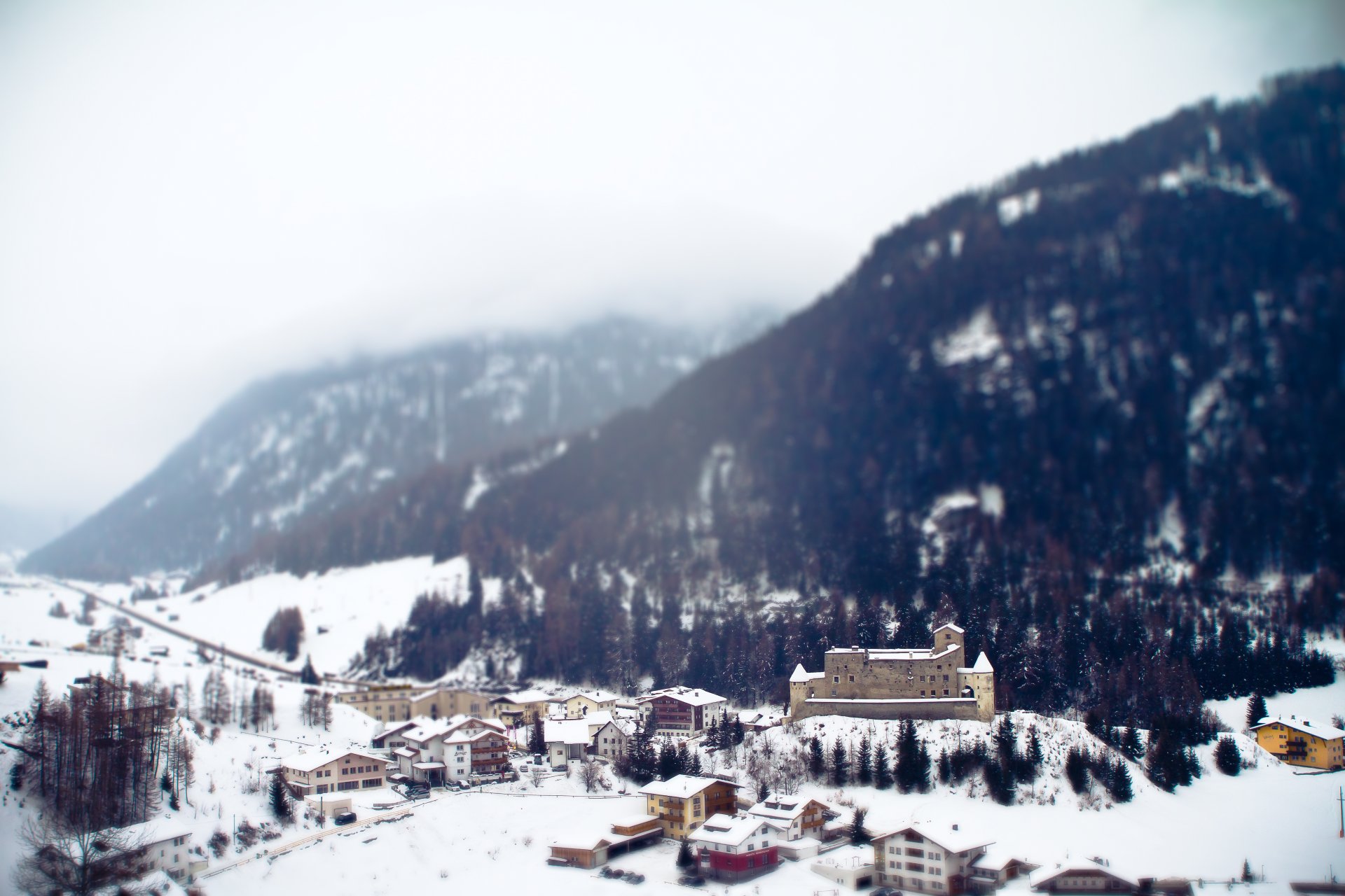 town resort mountain alps snow winter tilt-shift