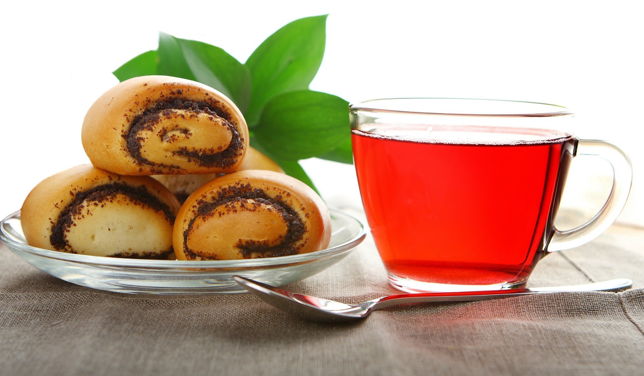 tea tea glass spoon cup buns poppy seeds saucer