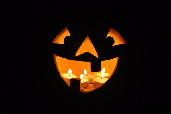 Halloween candles in a pumpkin