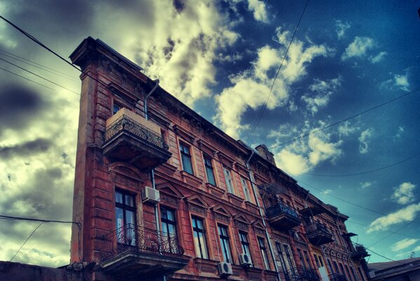 Single-walled house against the sky