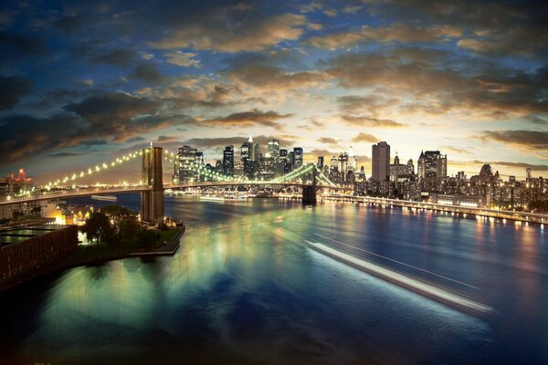 City bridge with lights on sunset background