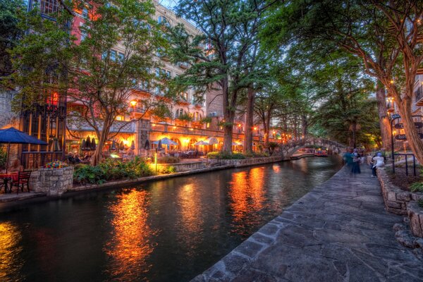 Buildings with beautiful lighting on the river bank