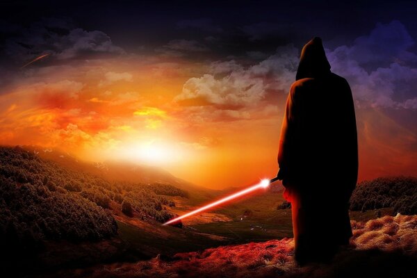 Anakin se tient debout et regarde le coucher du soleil tenant un sabre laser dans ses mains