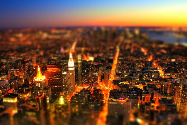 View from the height of the city glowing with orange lights