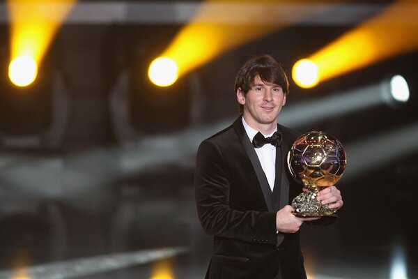 A famous football player with a valuable award