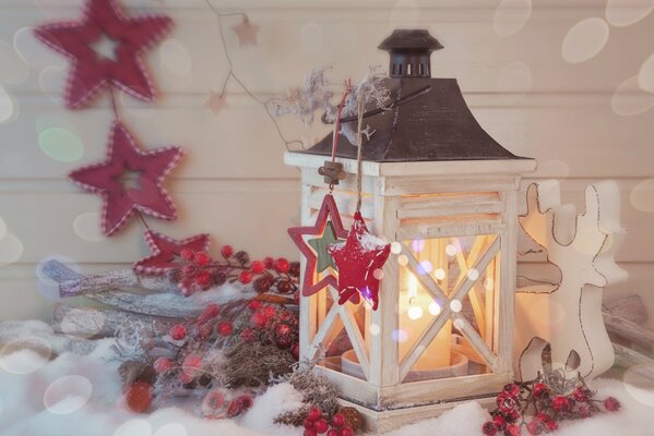 Linterna de Navidad con velas con ciervos y estrellas