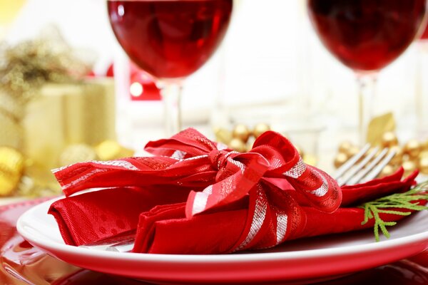 Red napkins tied with a ribbon