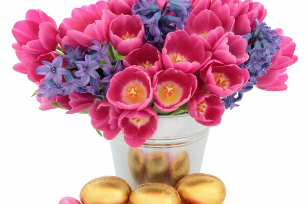 Composition of a bouquet and eggs on a white background