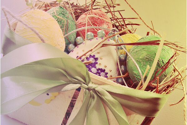 Basket of eggs with a green bow