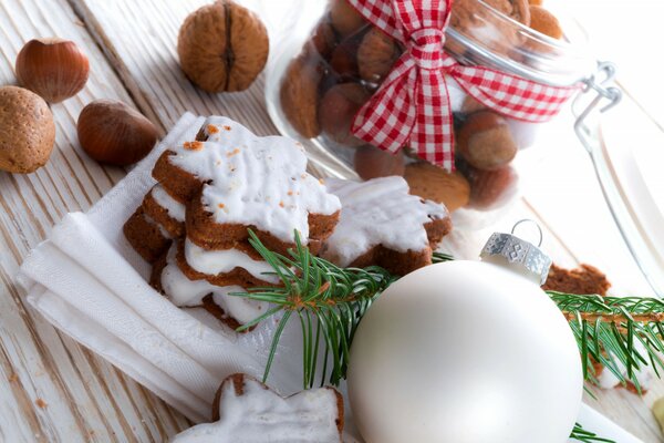 Christmas cookies with nuts and a Christmas tree toy