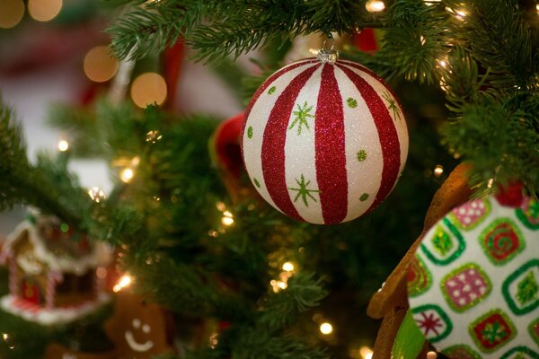 Christmas tree toy on a branch for the new year