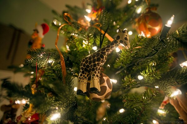 Toy giraffe on the Christmas tree