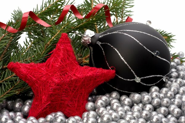 New Year s red star. black christmas ball