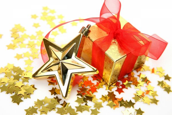 Gift. holiday. gold star on the gift box