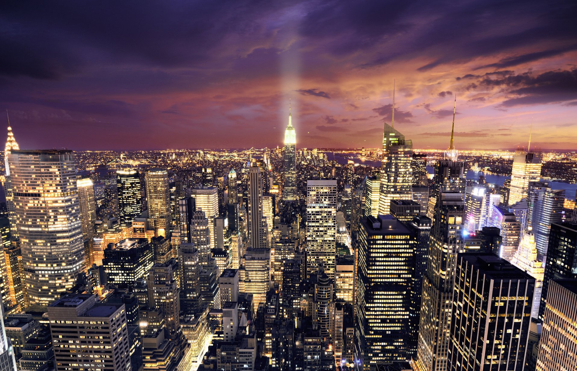 new york amerika nacht licht häuser lichter straßen himmel wolken foto