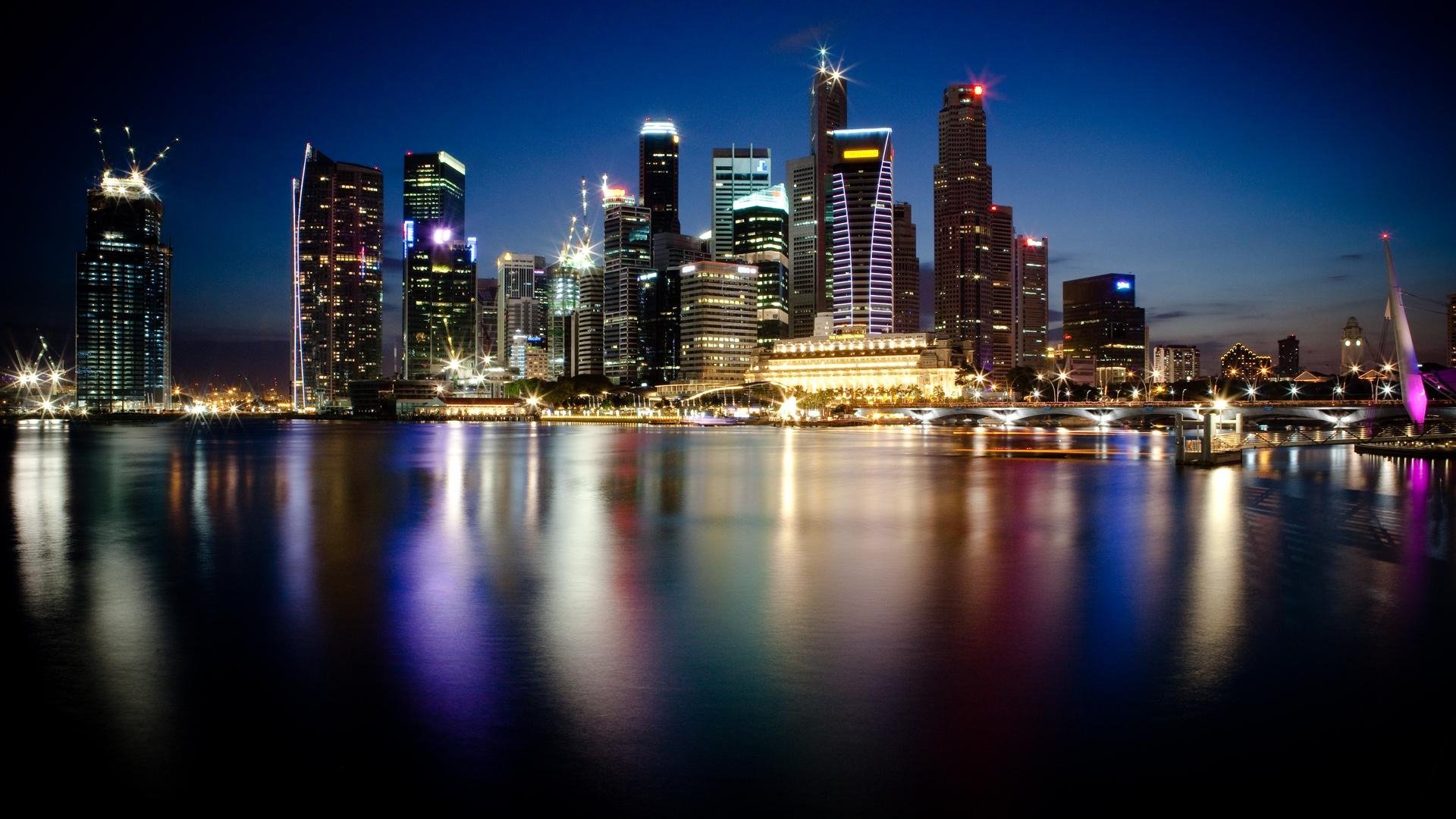 singapur noche ciudad metrópolis rascacielos luces agua reflexión foto fondo de pantalla