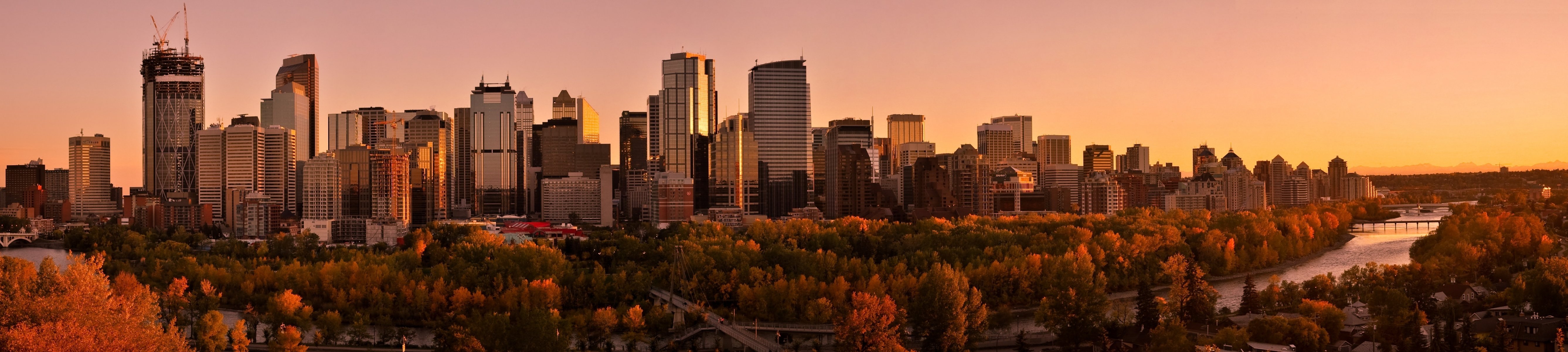 canada città calgary edifici grattacieli case panorama fiume acqua strada autunno alberi piazza parco tramonto cielo riflessione multi monitor carta da parati