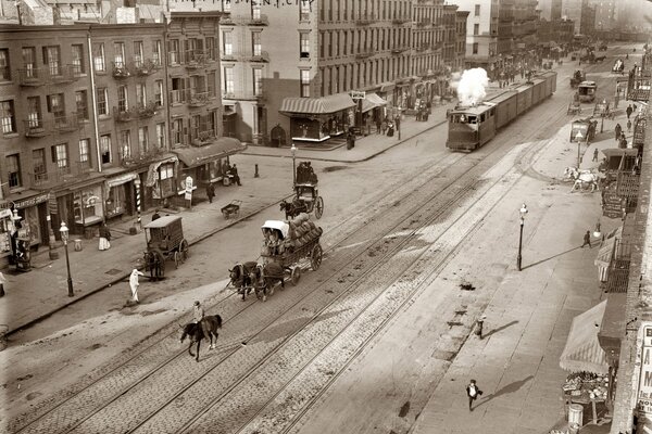 A street with carts and a tram