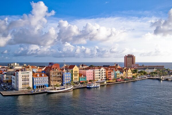 Bright colored houses on the river bank