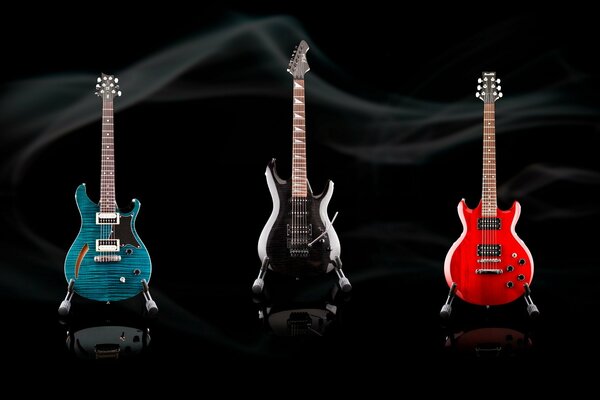 Bright guitars on a black background