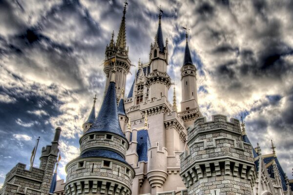 Castle against a cloudy sky photographed from below