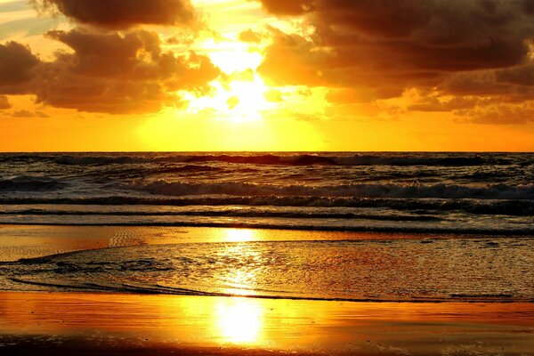 Sea waves at sunset