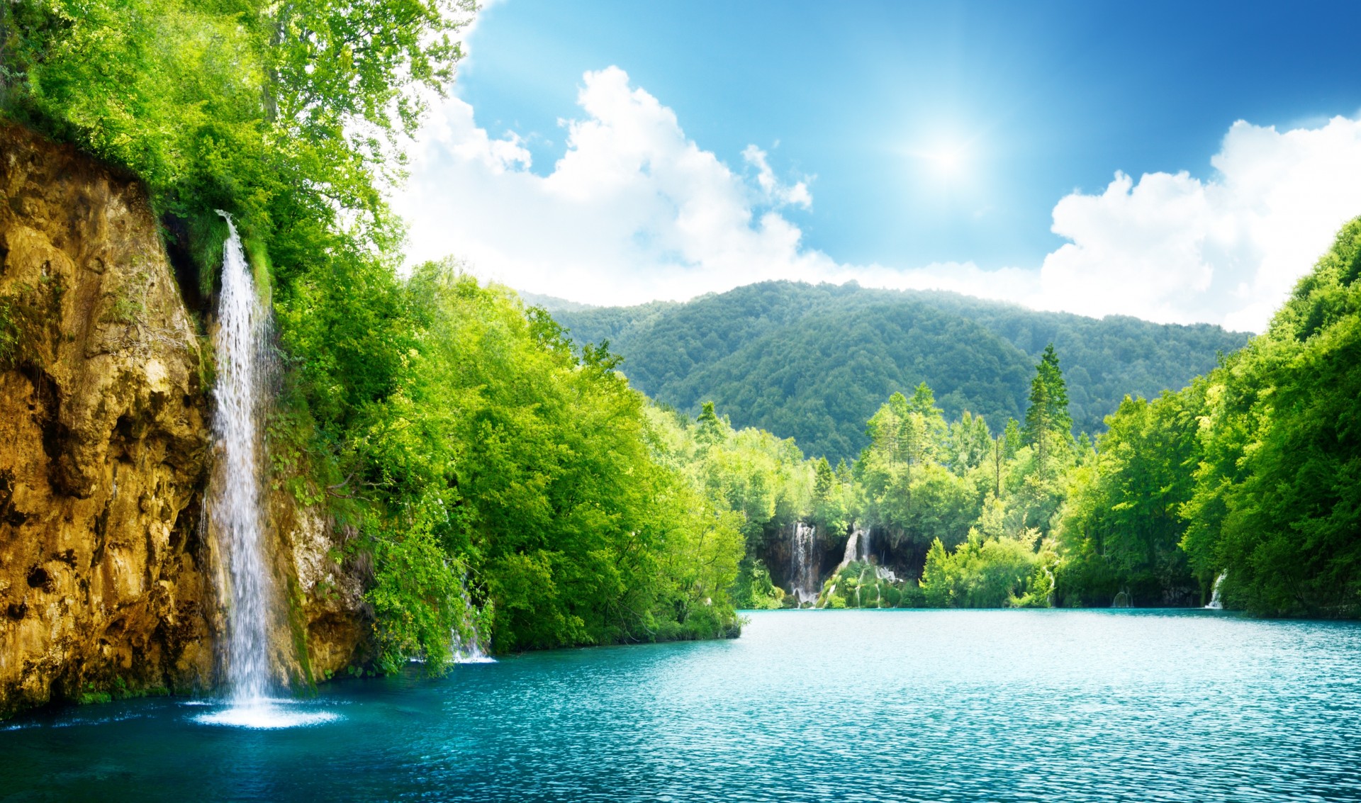 cielo luce del sole lago natura paesaggio foresta profonda palme mare bello cascata nuvole