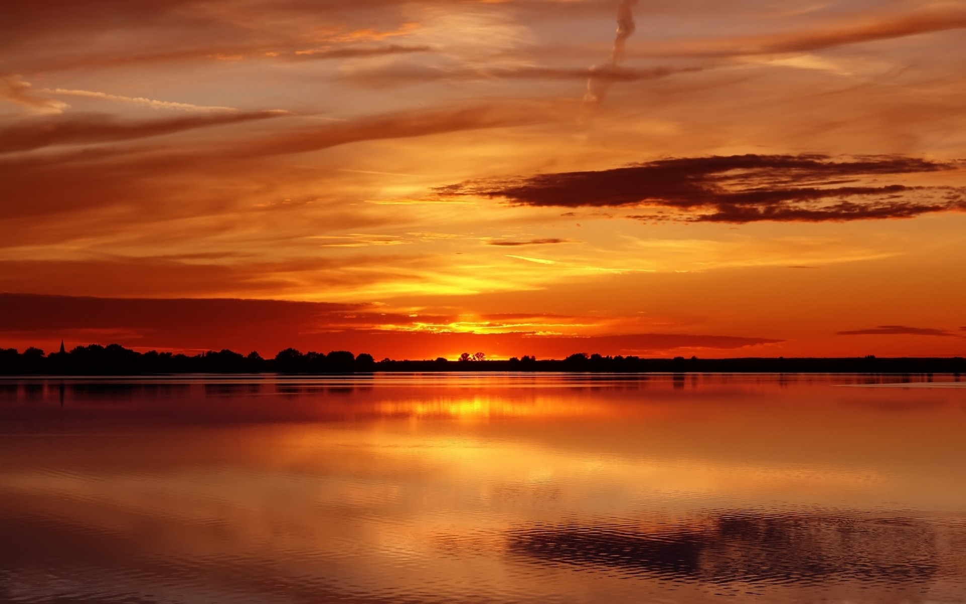 lightness orange sunset sky water clouds ripple serenity surface of