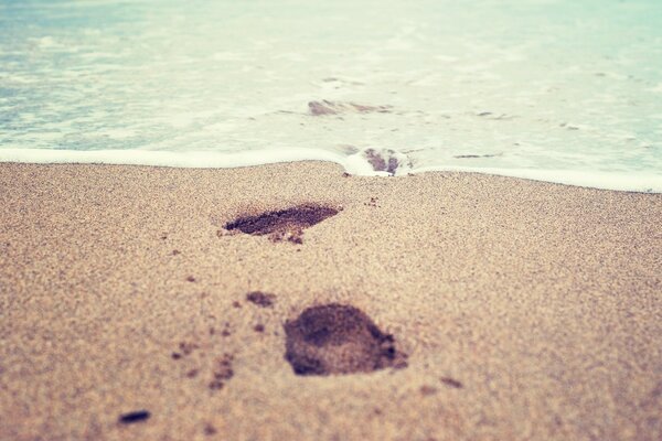 The water will wash away your footprints in the sand