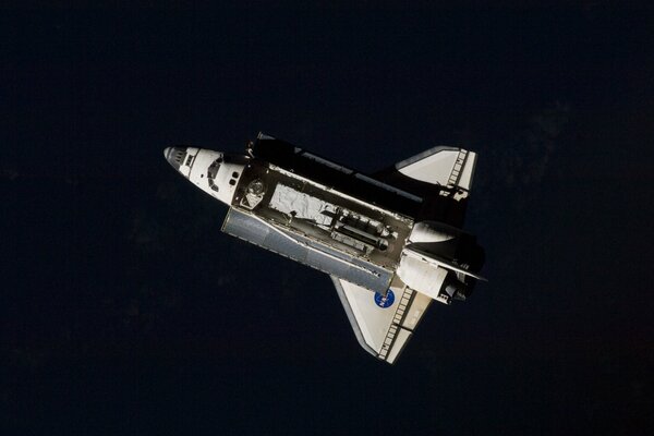 Space shuttle on a black background