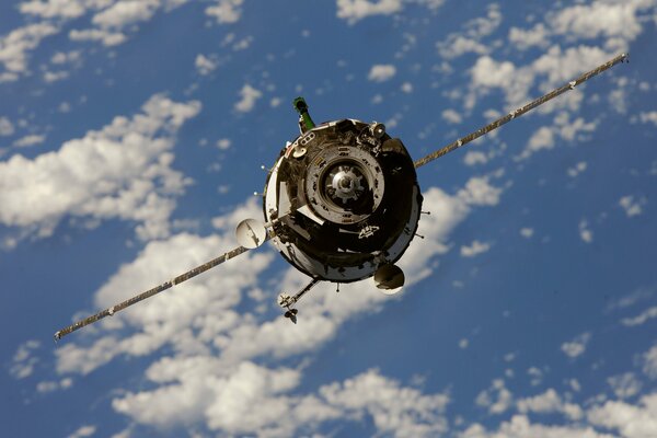 Soyuz-TMA-01m orbiting the Earth in space