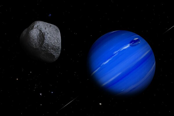 A planet and an asteroid on a black space background