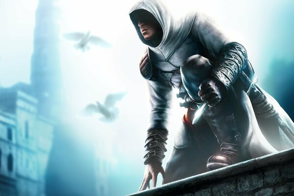 Assassin assassin in a cloak with a blade