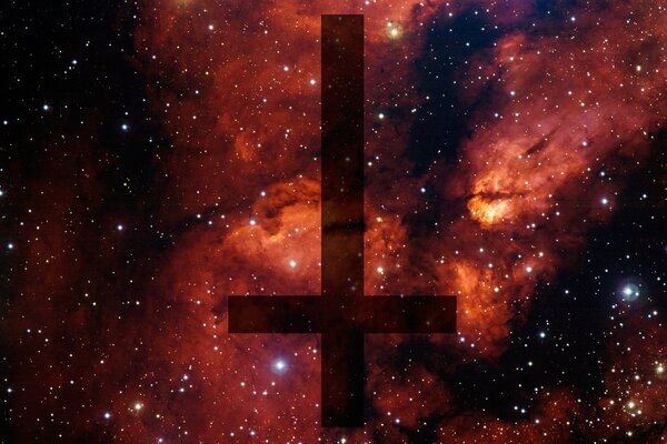 An inverted Christian cross against the background of space