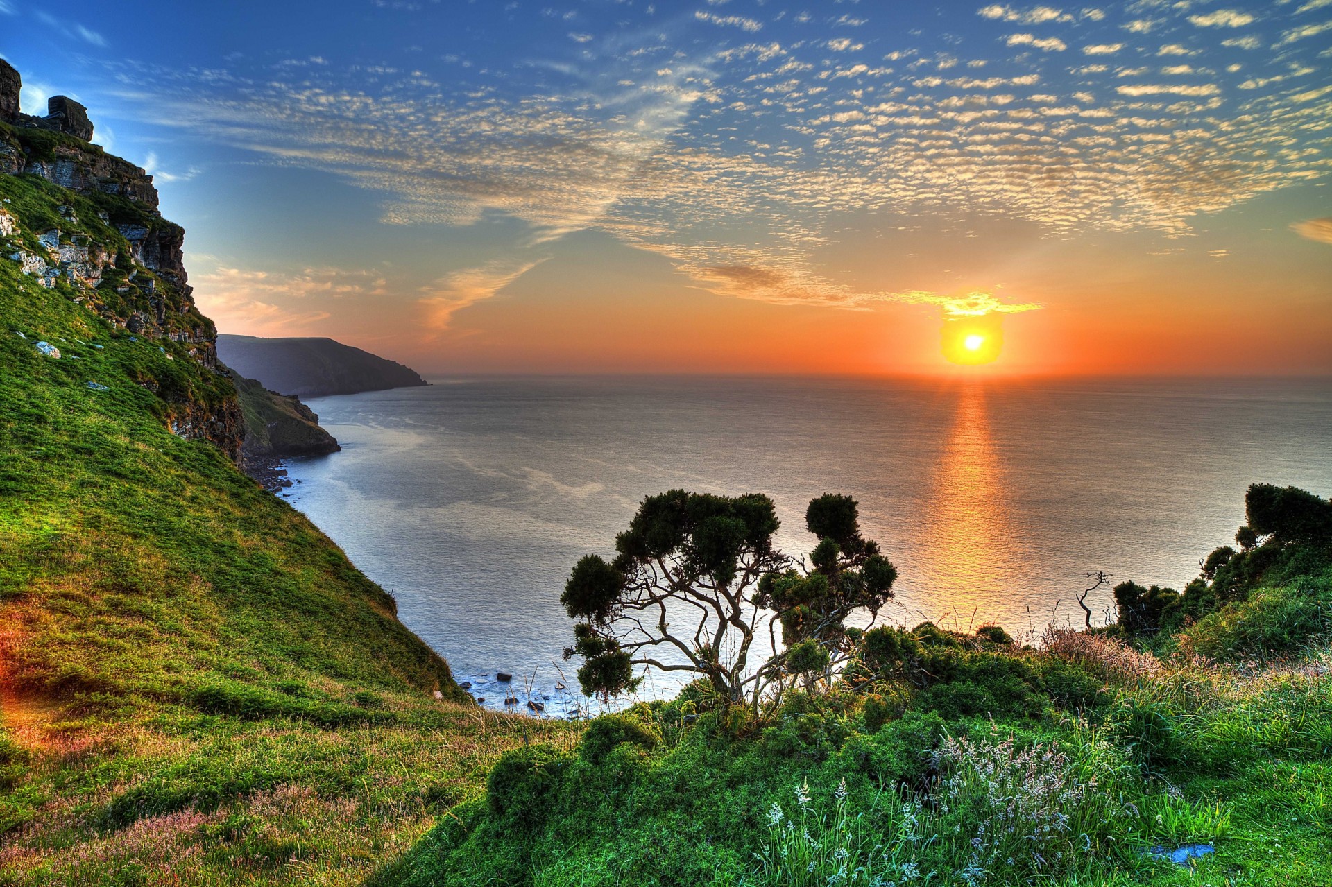 unset coast exmoor sea united kingdom