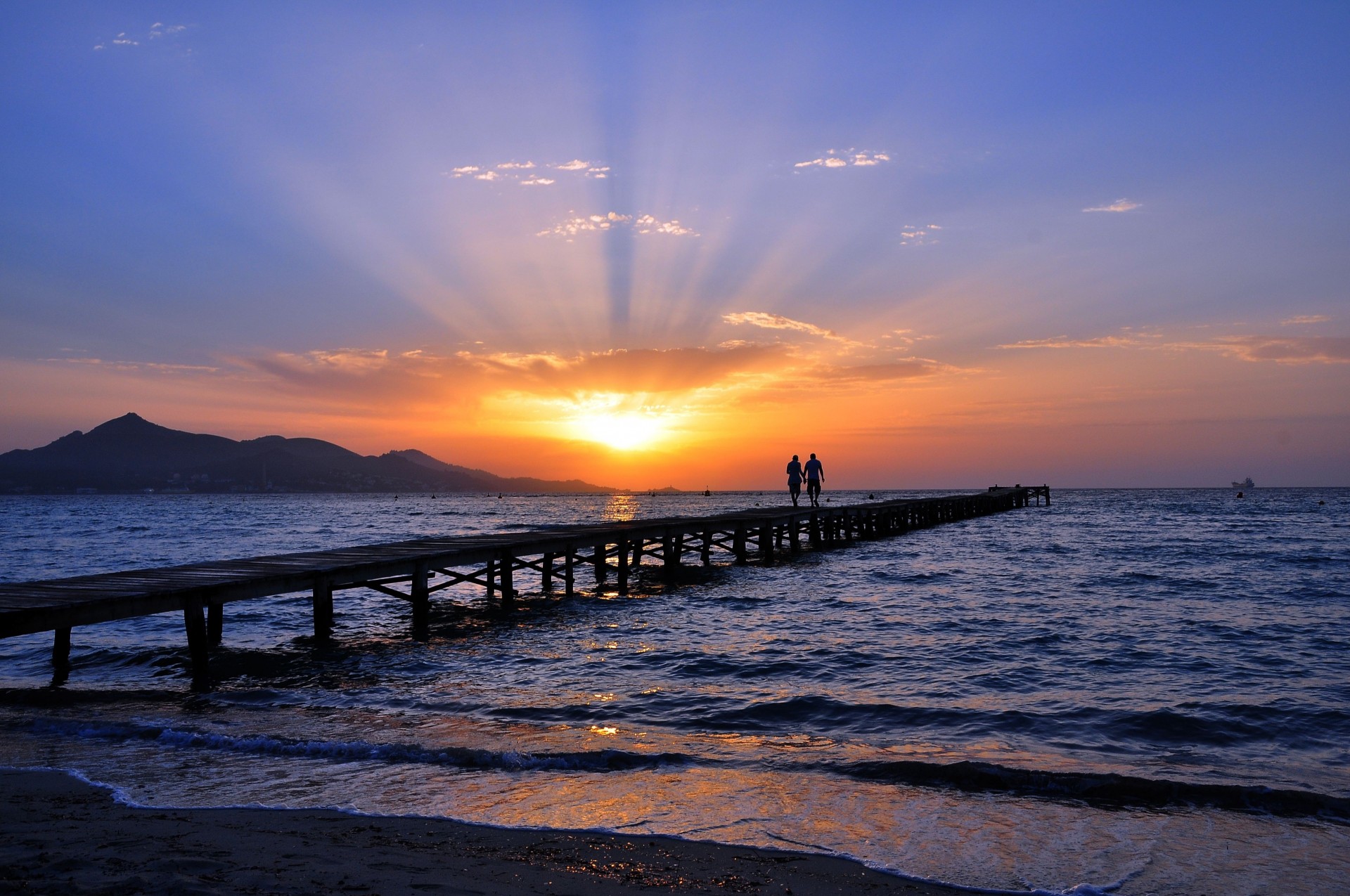 paysage mer plage pont coucher de soleil