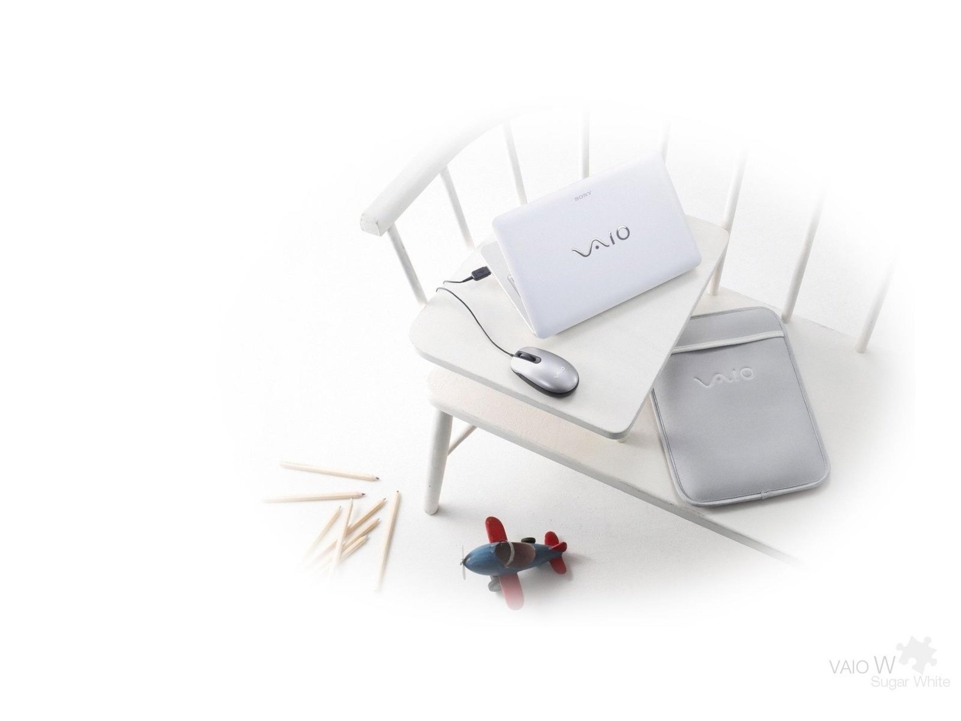 ony vaio laptop bench toy mouse white background