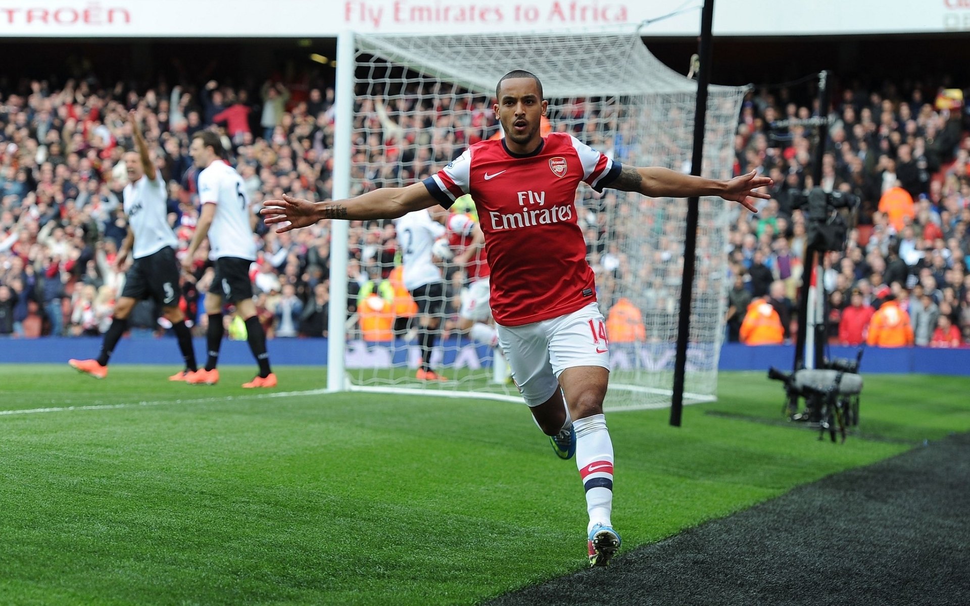 arsenal football club gunners theo walcott goal background