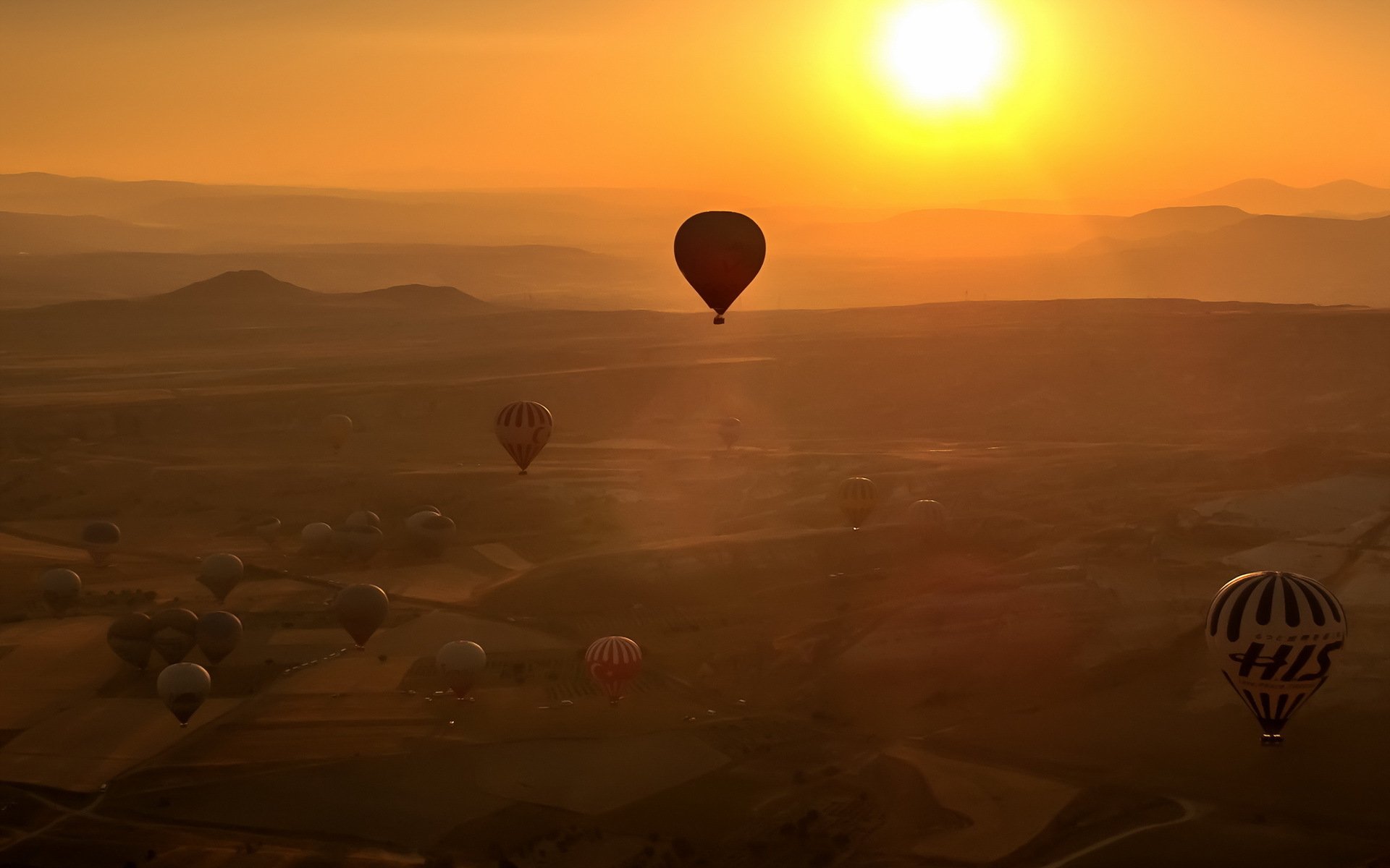 ballons coucher de soleil sport paysage