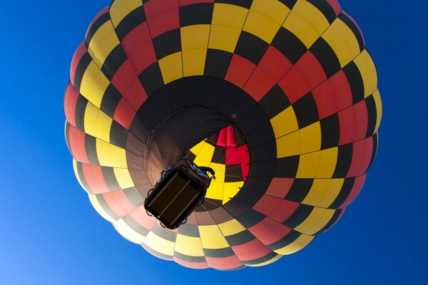 Red and yellow balloon in the sky