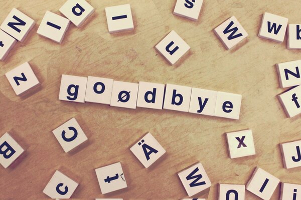 Inscripción Goodbye compuesta de cubos con letras