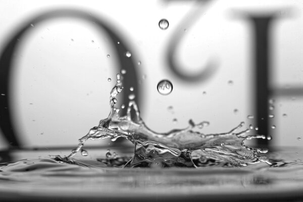 Water drop h2o black and white background