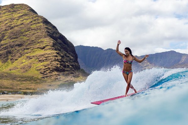 Ocean girl surfing