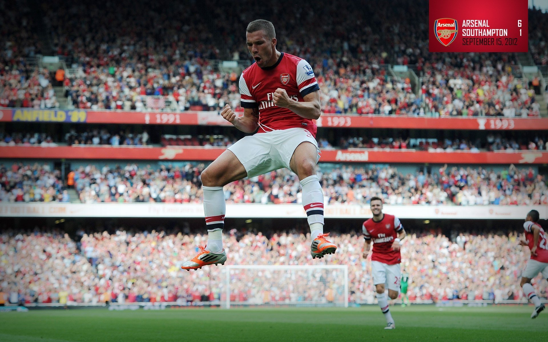 lukas podolski man footballer arsenal football club gunners stadium background